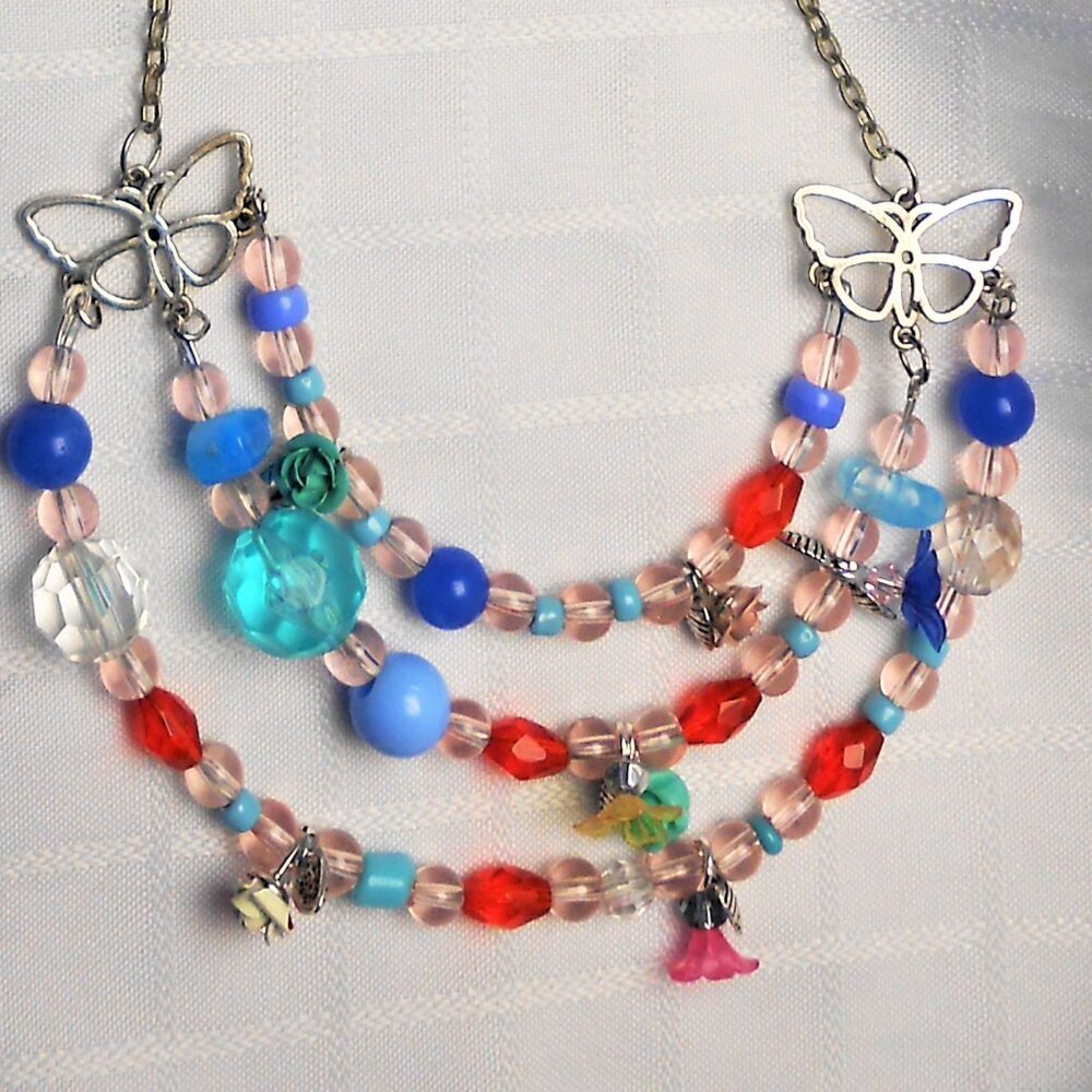 No 985 Beautiful handmade necklace with multiple rows and butterflies